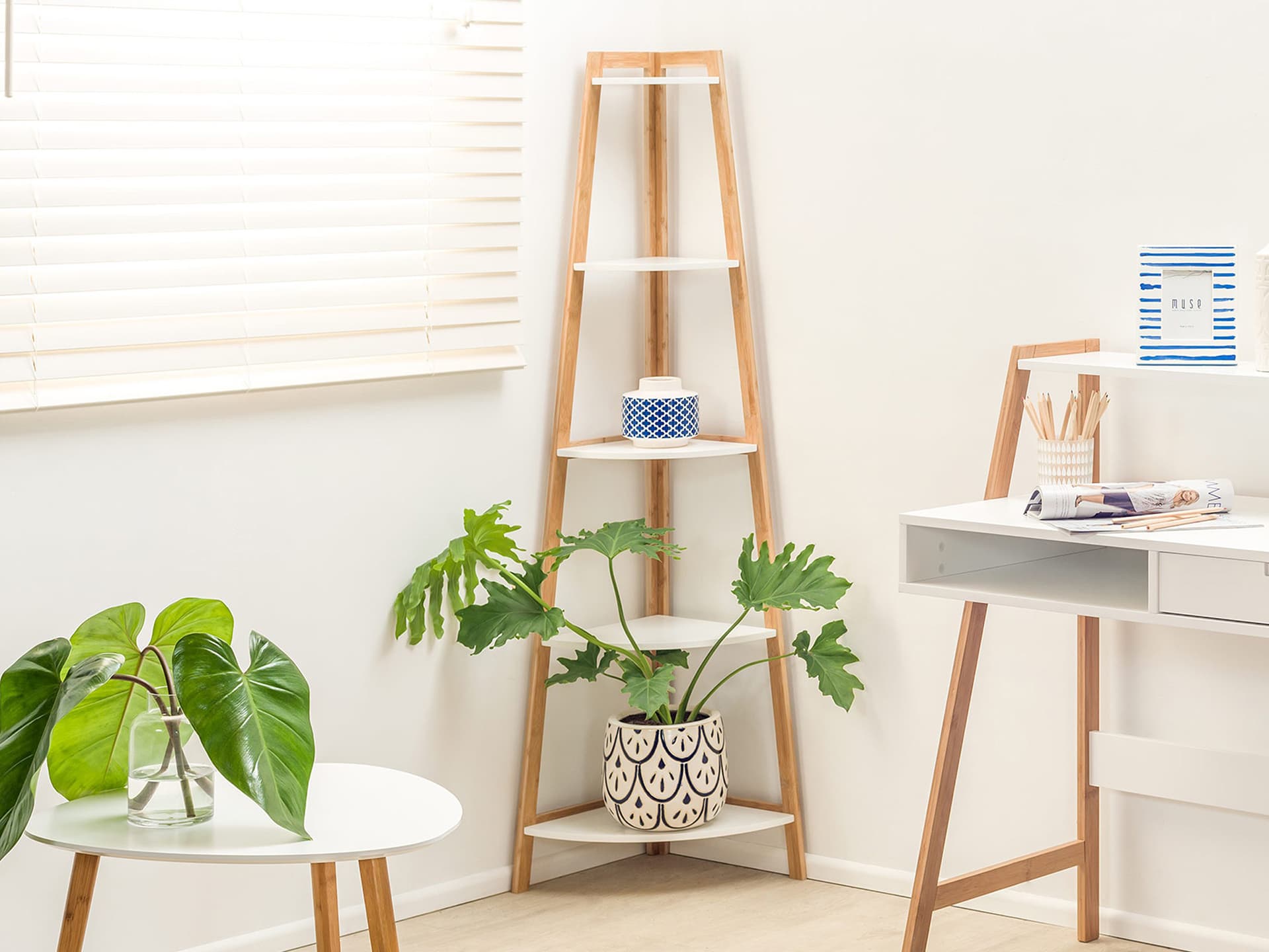 Maya-corner-shelf-in-white-and-blonde-timber-in-corner-of-room